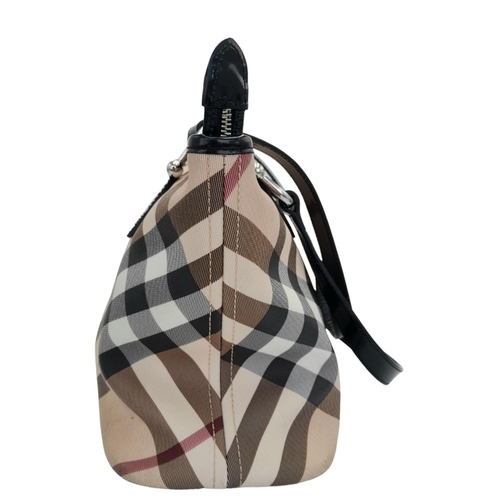 229 - A Burberry Beige Check Nova Bag. Coated canvas exterior with leather trim, two leather straps, silve... 