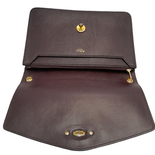 338 - A Mulberry Oxblood Darley Bag. Leather exterior with gold-toned hardware and twist lock closure. Bur... 