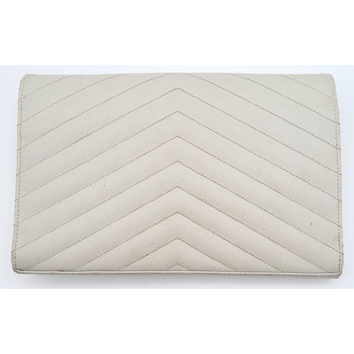 58 - A YSL Ivory Cassandre Wallet Bag. Leather exterior with gold-toned hardware, the iconic YSL logo, re... 