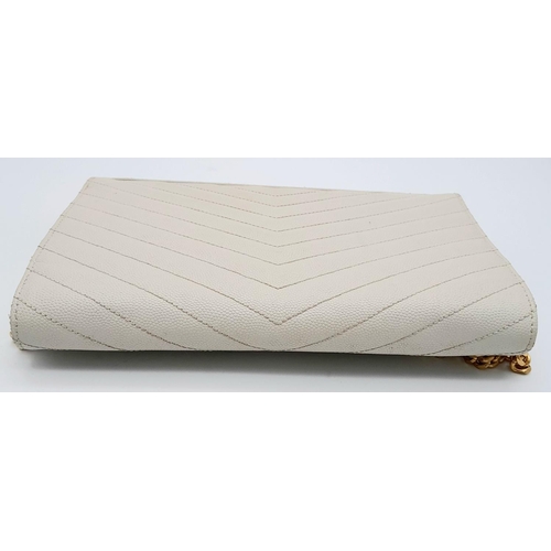 58 - A YSL Ivory Cassandre Wallet Bag. Leather exterior with gold-toned hardware, the iconic YSL logo, re... 