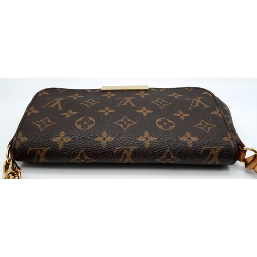 65 - A Louis Vuitton Favourite PM Bag. Monogramed canvas exterior with gold-toned hardware, thin leather ... 