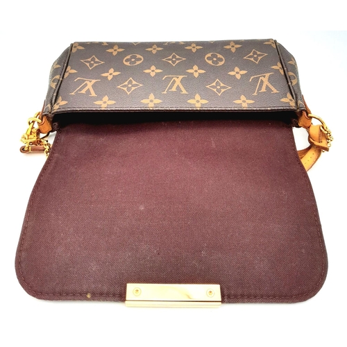 65 - A Louis Vuitton Favourite PM Bag. Monogramed canvas exterior with gold-toned hardware, thin leather ... 