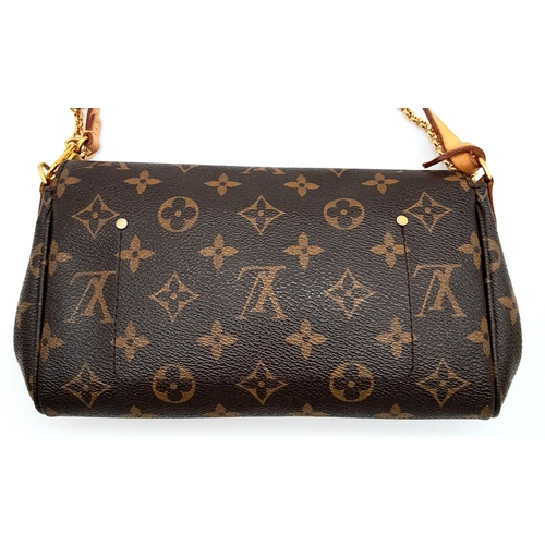 65 - A Louis Vuitton Favourite PM Bag. Monogramed canvas exterior with gold-toned hardware, thin leather ... 