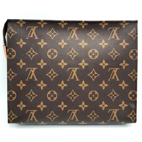 72 - A Louis Vuitton Toiletries Pouch. Monogramed canvas exterior with gold-toned hardware and zipped top... 