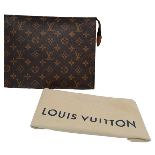 72 - A Louis Vuitton Toiletries Pouch. Monogramed canvas exterior with gold-toned hardware and zipped top... 