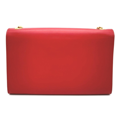 9 - A YSL Red Kate Tassel Crossbody Bag. Leather exterior with gold-toned hardware, the iconic YSL logo,... 