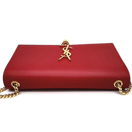 9 - A YSL Red Kate Tassel Crossbody Bag. Leather exterior with gold-toned hardware, the iconic YSL logo,... 