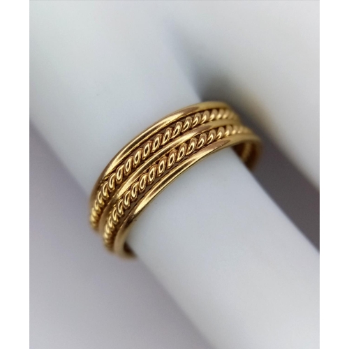 228 - A 16ct Yellow Gold (tested as) Stacking Ring, size I, 2.7g total weight.

ref: 1515I