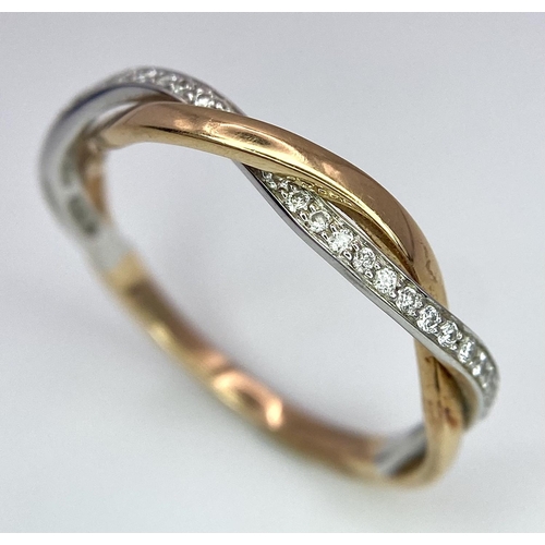 260 - A job lot of three 18 K yellow gold items, consisting of a diamond bangle with an elegant cross over... 