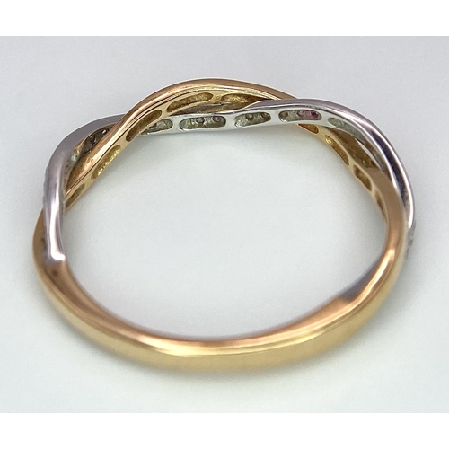 260 - A job lot of three 18 K yellow gold items, consisting of a diamond bangle with an elegant cross over... 