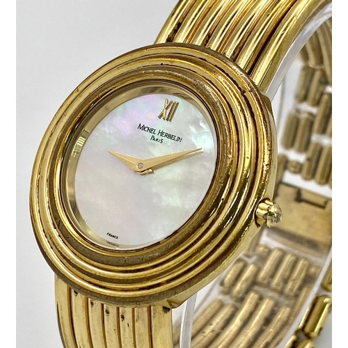 353 - A Michel Herbelin Gold Plated Quartz Ladies Watch. Circular case diameter - 32mm. Mother of pearl di... 