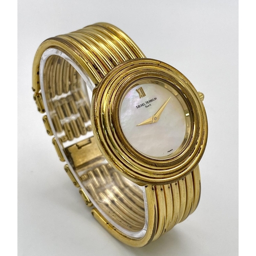 353 - A Michel Herbelin Gold Plated Quartz Ladies Watch. Circular case diameter - 32mm. Mother of pearl di... 