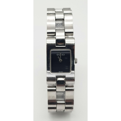 354 - A Designer Gucci Stainless Steel Quartz Ladies Watch. Stainless steel bracelet and case - 17mm. Blac... 