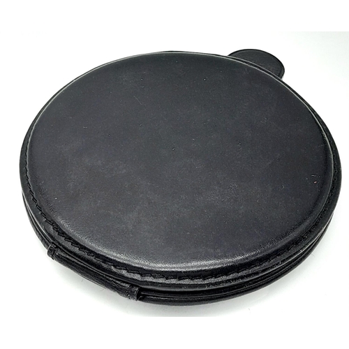 485 - A vintage, CARTIER PANTHER double vanity mirror in a soft black leather cover, diameter: 9 cm. Ref: ... 