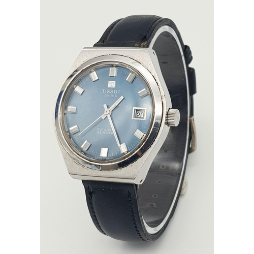 486 - A Vintage Tissot Automatic Gents Watch. Black leather strap. Stainless steel case - 37mm. Blue dial ... 