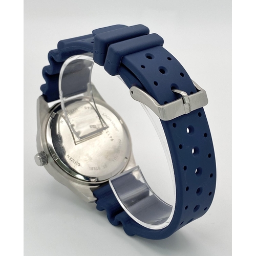 500 - A Citizen Quartz Gents Watch. Blue rubber strap. Stainless steel case - 42mm. Blue dial with date wi... 