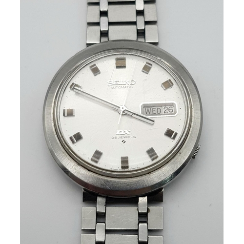 507 - A Seiko Automatic DX 25 Jewels Gents Watch. Bracelet needs replacing. Case - 36mm. In working order.