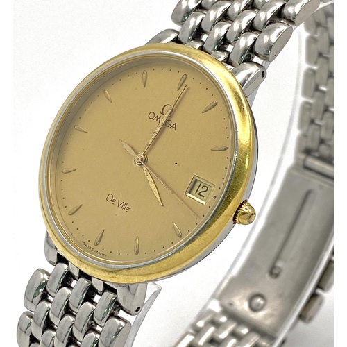 60 - A Vintage Omega Deville Quartz Gents Watch. Stainless steel bracelet and gilded case - 33mm. Gilded ... 