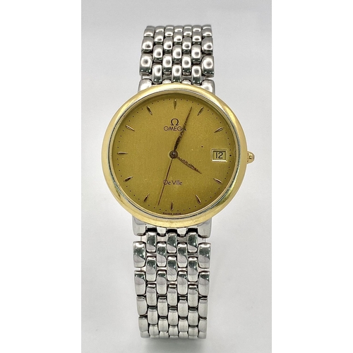 60 - A Vintage Omega Deville Quartz Gents Watch. Stainless steel bracelet and gilded case - 33mm. Gilded ... 