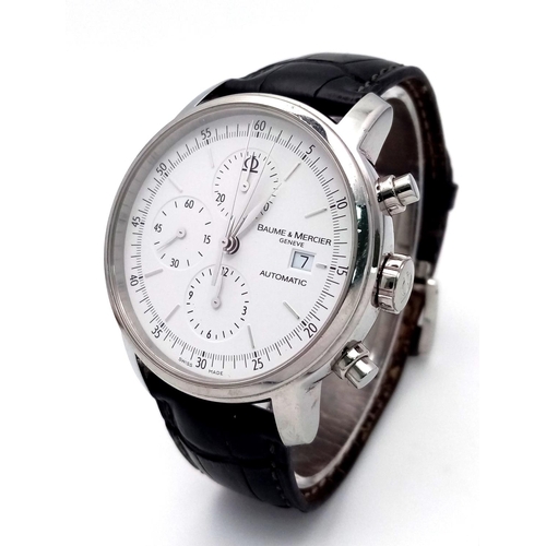 74 - A Baume and Mercier Automatic Gents Watch. Black leather strap. Stainless steel case - 42mm. White d... 