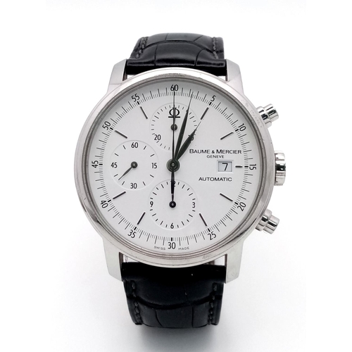 74 - A Baume and Mercier Automatic Gents Watch. Black leather strap. Stainless steel case - 42mm. White d... 