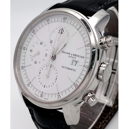 74 - A Baume and Mercier Automatic Gents Watch. Black leather strap. Stainless steel case - 42mm. White d... 