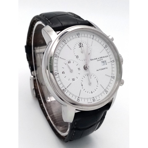 74 - A Baume and Mercier Automatic Gents Watch. Black leather strap. Stainless steel case - 42mm. White d... 