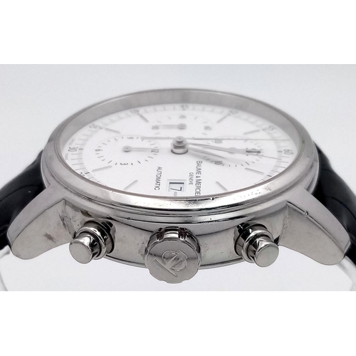 74 - A Baume and Mercier Automatic Gents Watch. Black leather strap. Stainless steel case - 42mm. White d... 