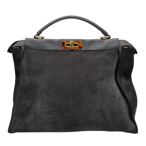 86 - A Fendi Grey Peekaboo Bag. Suede exterior with leather trim, single leather handle, gold-toned hardw... 