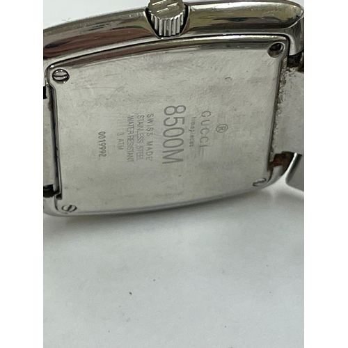 234 - A Gents Gucci 8500M quartz date watch , needs battery as found .