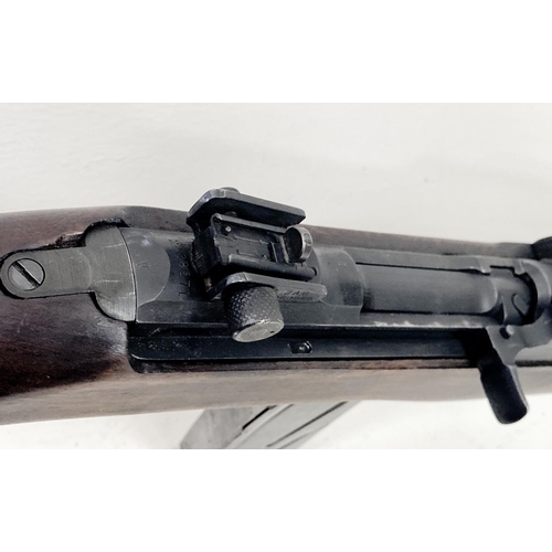 137 - A Deactivated Winchester M1 Carbine Rifle. This .30 calibre rifle was designed by Winchester and aft... 