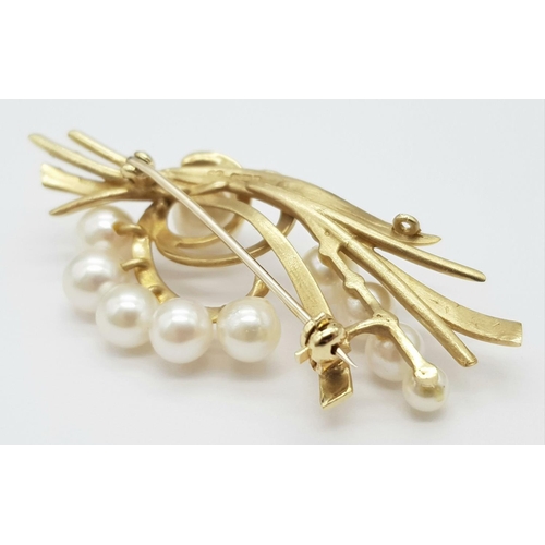 178 - A 9K Yellow Gold and Decorative Cultured Pearl Brooch. 5cm x 2.5cm. 8g total weight.