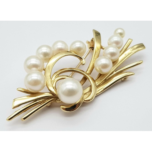 178 - A 9K Yellow Gold and Decorative Cultured Pearl Brooch. 5cm x 2.5cm. 8g total weight.