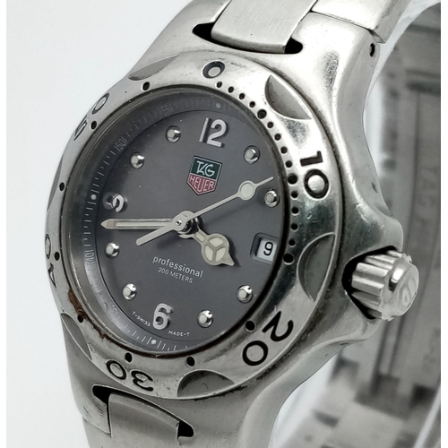 351 - A Tag Heuer Professional Ladies Quartz Watch. Stainless steel bracelet and case - 28mm. Grey dial wi... 