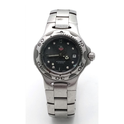 351 - A Tag Heuer Professional Ladies Quartz Watch. Stainless steel bracelet and case - 28mm. Grey dial wi... 