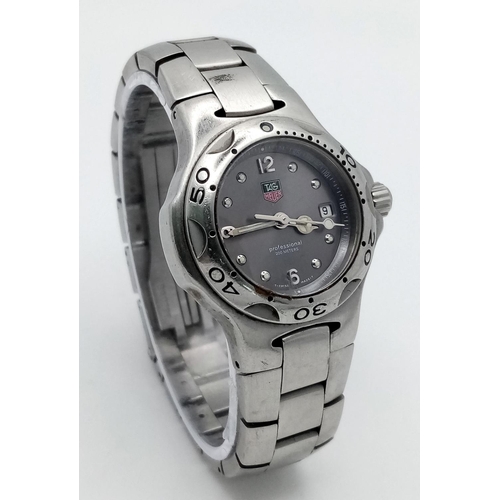 351 - A Tag Heuer Professional Ladies Quartz Watch. Stainless steel bracelet and case - 28mm. Grey dial wi... 