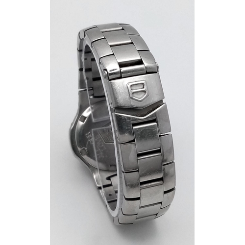 351 - A Tag Heuer Professional Ladies Quartz Watch. Stainless steel bracelet and case - 28mm. Grey dial wi... 