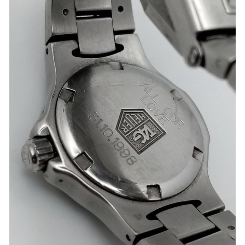 351 - A Tag Heuer Professional Ladies Quartz Watch. Stainless steel bracelet and case - 28mm. Grey dial wi... 