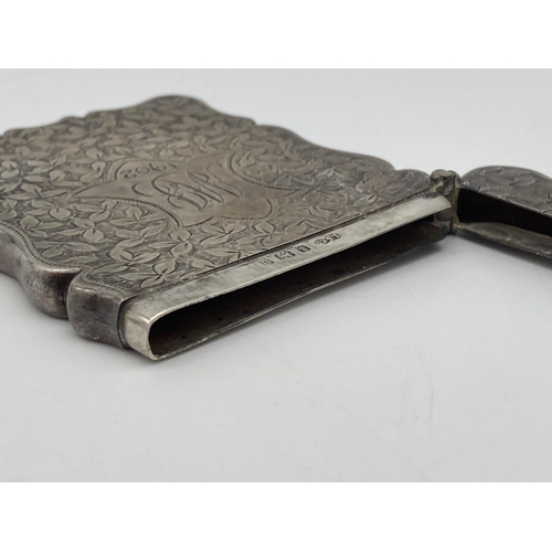 375 - An Edwardian Sterling Silver Card Case. Floral engraving with monogram cartouche. Birmingham hallmar... 