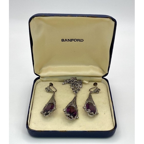 548 - An Art Deco Silver, Marcasite and Purple Stone Necklace and Earring Set. Necklace and pendant - 40 a... 