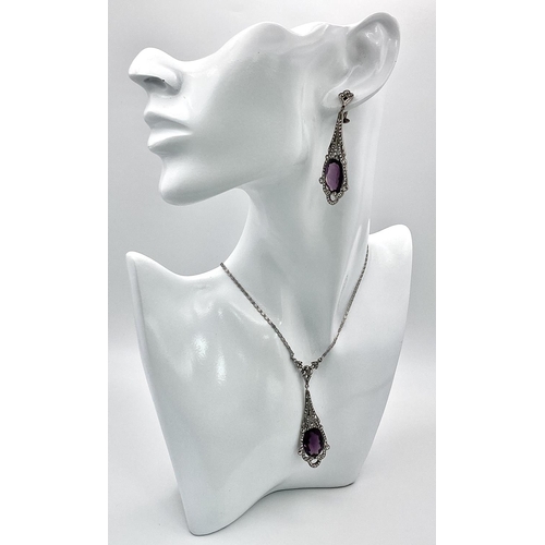 548 - An Art Deco Silver, Marcasite and Purple Stone Necklace and Earring Set. Necklace and pendant - 40 a... 