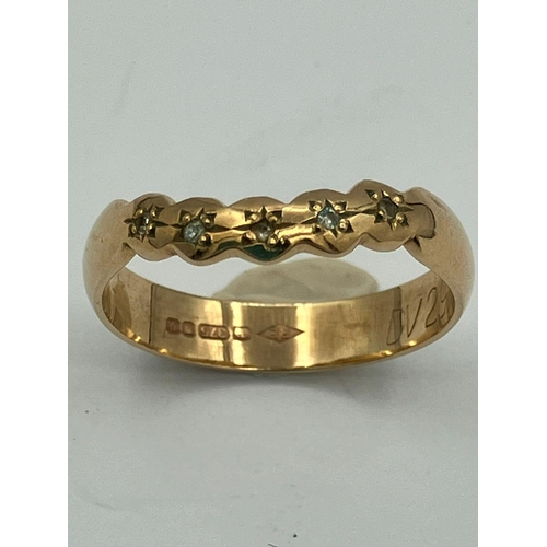 111 - 9 carat GOLD and DIAMOND WISHBONE RING . Having attractive serpentine top, set with five Diamond det... 