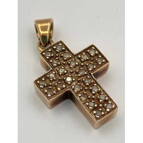 146 - 9 carat GOLD, DIAMOND SET CROSS PENDANT, consisting a DIAMOND encrusted (0.25 carat) chunky GOLD CRO... 