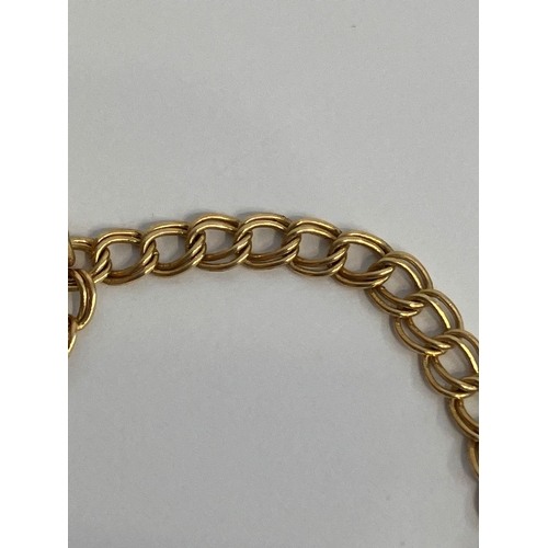 21 - 9 carat GOLD DOUBLE LINK BRACELET. Complete with safety chain and having Heart Padlock  fastening wi... 