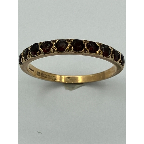 266 - Impressive 9 carat GOLD RING having 10 x GARNETS Mounted to top.Full UK hallmark.Presented in ring b... 