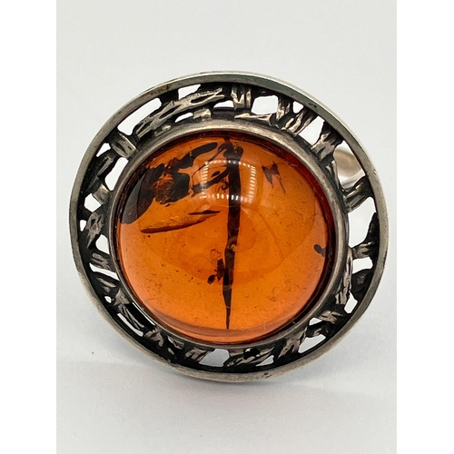 308 - Vintage SILVER and AMBER RING .Having  a large AMBER CABACHON set in a  Silver Saturn Planet mount. ... 