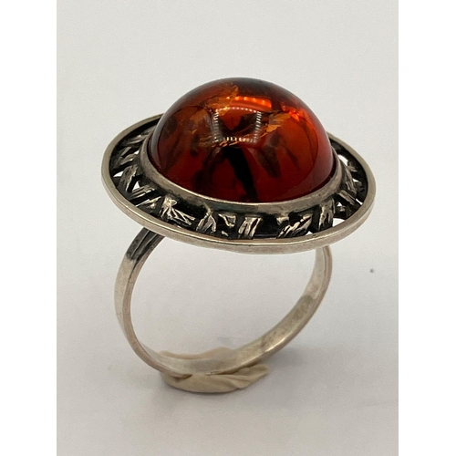 308 - Vintage SILVER and AMBER RING .Having  a large AMBER CABACHON set in a  Silver Saturn Planet mount. ... 