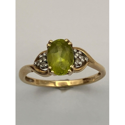 406 - QVC 9 carat GOLD and PERIDOT RING. Full UK hallmark.Complete with ring box.1.6 grams. Size J  - J 1/... 