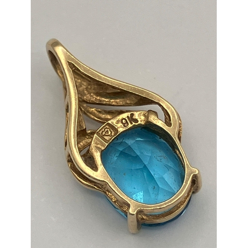 539 - 9 carat GOLD and TOPAZ PENDANT. Having  a 1.5 carat OCEAN BLUE TOPAZ ,Oval Cut and set in a four cla... 