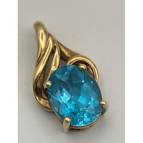 539 - 9 carat GOLD and TOPAZ PENDANT. Having  a 1.5 carat OCEAN BLUE TOPAZ ,Oval Cut and set in a four cla... 